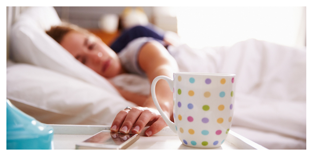 Girl Stopping Alarm on Bed