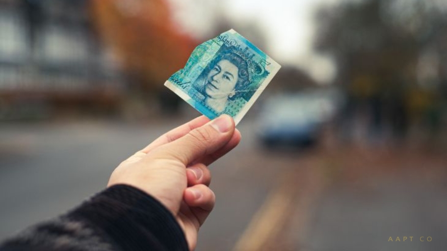 Man holding currency