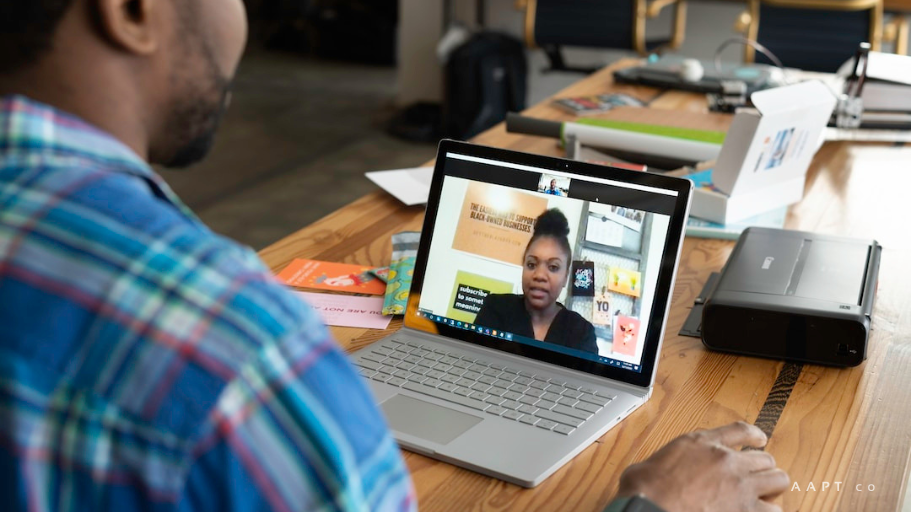 A person video chatting with a sales leader learning more about what is sales velocity.