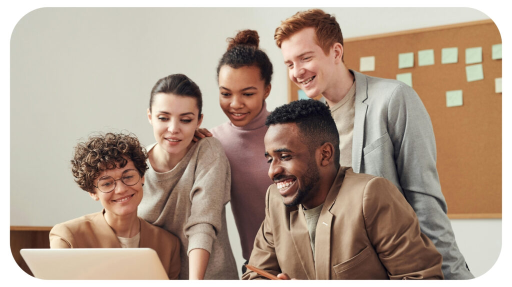 Photo Of People Looking On Laptop