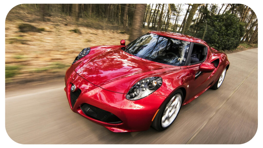 Red Alfa Romeo C4 on Road Near Trees