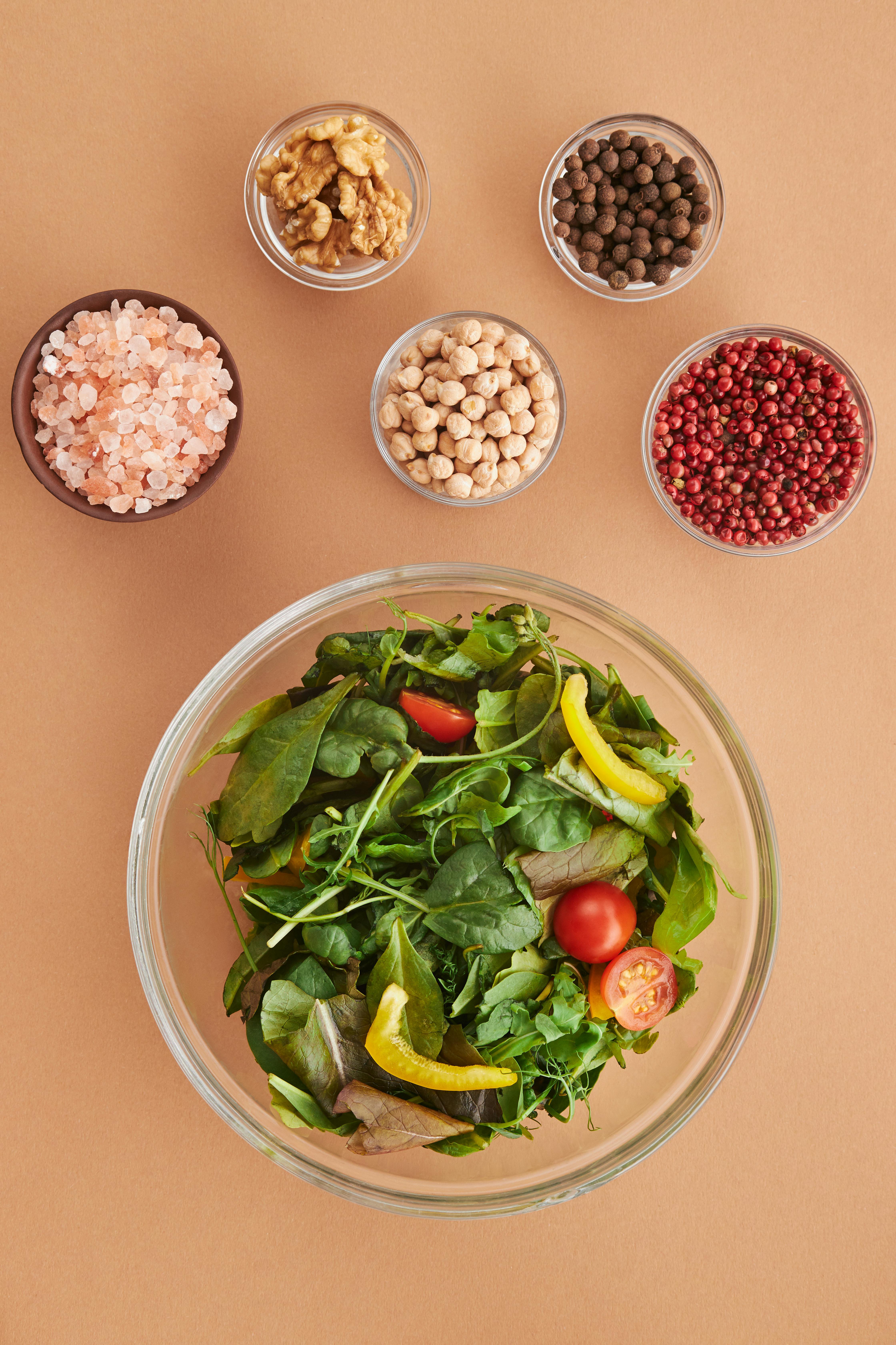 Fresh organic salad with natural ingredients herbs and healthy spices representing clean eating brain health emotional balance and organic nutrition for mental wellbeing.