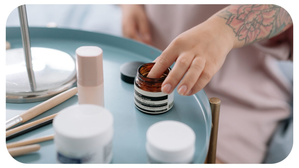 Person applying skincare cream as part of a simplified beauty routine, showcasing low maintenance beauty habits, skincare essentials, time saving beauty treatments, and long lasting beauty results for an effortless everyday look.